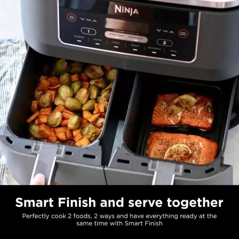 Photo 1 of Ninja DZ201 Foodi 8 Quart 6-in-1 DualZone 2-Basket Air Fryer with 2 Independent Frying Baskets, Match Cook & Smart Finish to Roast, Broil, Dehydrate & More for Quick, Easy Meals, Grey