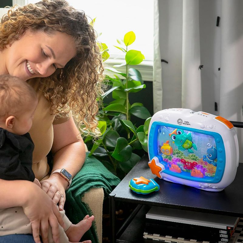 Photo 1 of Baby Einstein Sea Dreams Soother Musical Crib Toy and Sound Machine, Newborns Plus