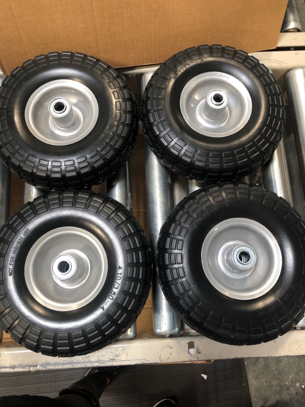 Photo 1 of BAIVE 4.10/3.50-4” Tire and Wheel Flat Free, 4 Pack 10” Solid Tires, 5/8" Axle Bore Hole, 2 1/4” Offset Hub for Dolly Hand Truck Utility Carts