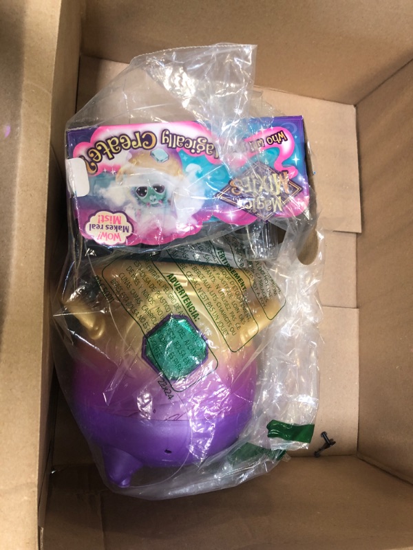 Photo 1 of Magic Mixies Magical Misting Cauldron with Interactive 8 inch Blue Plush Toy and 50+ Sounds and Reactions, Multicolor