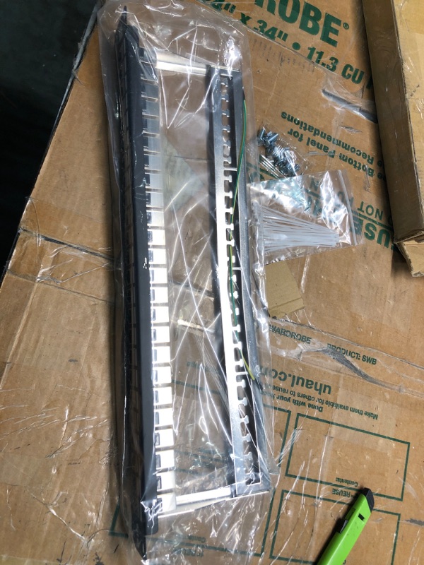 Photo 4 of TRENDnet 24-Port Cat6A Shielded Patch Panel, 1U 19" Metal Housing, 10G Ready, Cat5e,Cat6,Cat6A Compatible, Cable Management, Color-Coded Labeling for T568A and T568B Wiring, Black, TC-P24C6AS 24 Port Cat6A