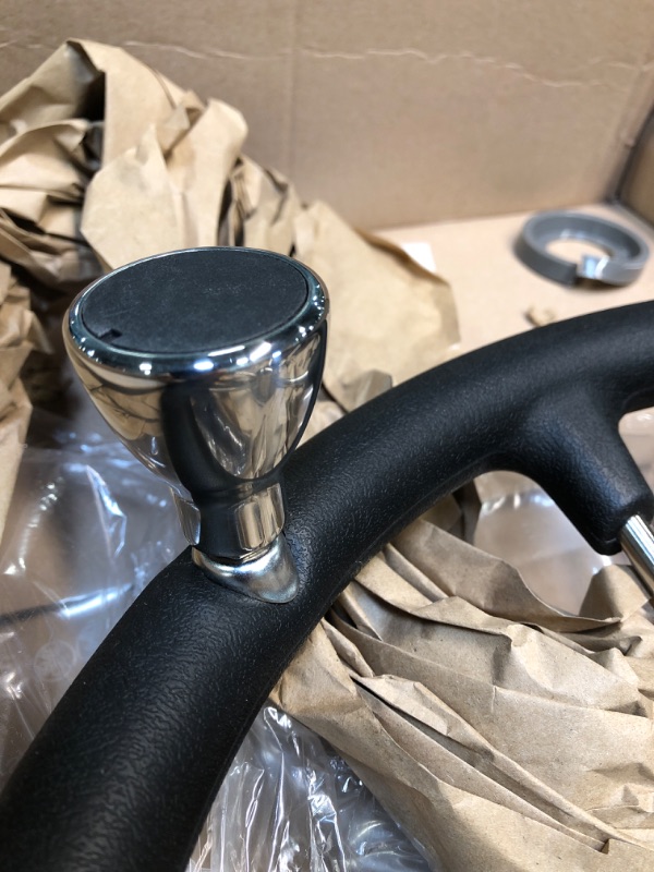 Photo 1 of black/chrome steering wheel with built in turning assist knob