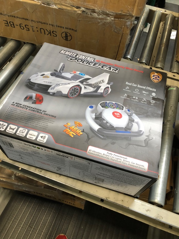 Photo 1 of Remote Control Police Car, 4D Motion Gravity and Steering Wheel Control, 1:12 Scale, 2.4Ghz, with Lights, Sirens, Powered Doors, (TR-911)
