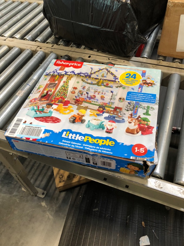 Photo 1 of Fisher-Price Little People Advent Calendar, Christmas santa playset, 24 Toys for Pretend Play, Gift for Toddlers and Preschool Kids Ages 1 to 5 Years