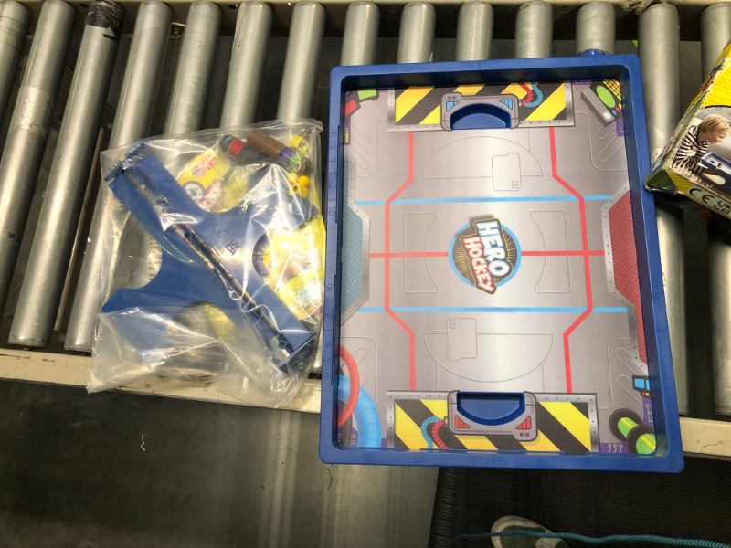 Photo 3 of Hero Hockey | Fast Action Hockey Game with Magnets | Skill and Dexterity Game for Adults and Kids | Fun Family Game | Ages 5 and up | 2 Players | Average Playtime 10 Minutes