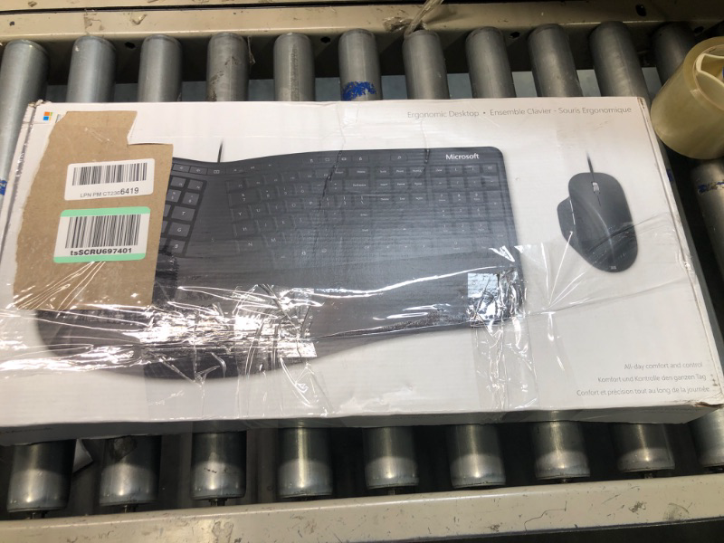 Photo 1 of Microsoft Ergonomic Desktop - Black - Wired, Comfortable, Ergonomic Keyboard and Mouse Combo, with Cushioned Wrist and Palm Support. Split Keyboard. Dedicated Office Key.