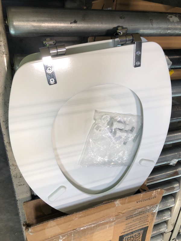 Photo 3 of ***SMALL CHIP ON SEAT*** Elongated Enameled Wood Toilet Seat with Never Loosens Chrome Hinge White - Mayfair by Bemis