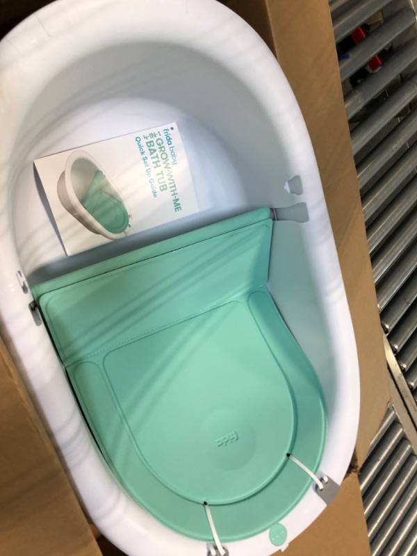 Photo 1 of Frida Baby 4-in-1 Grow-with-Me Bath Tub| Transforms Infant Bathtub to Toddler Bath Seat with Backrest for Assisted Sitting in Tub
