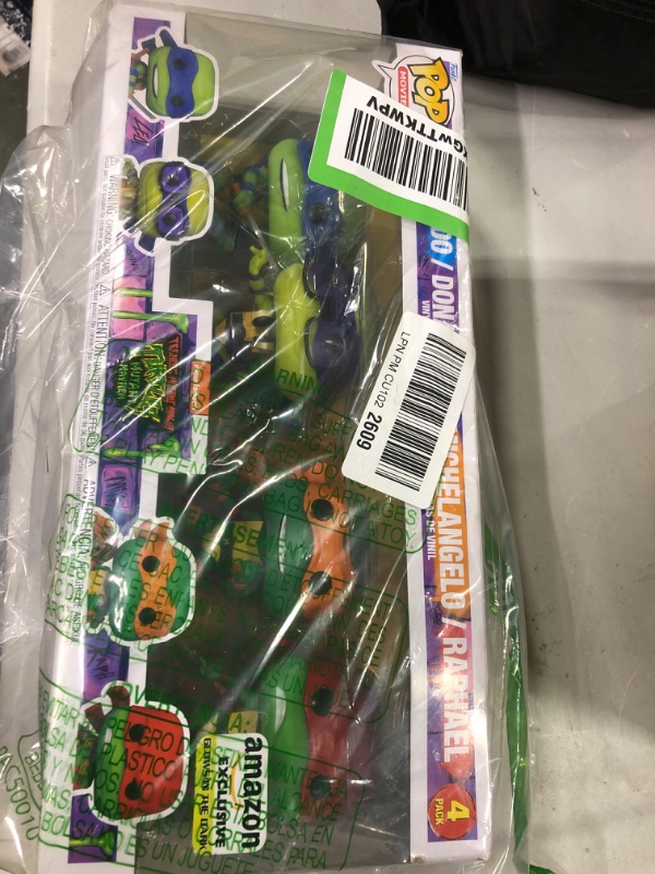 Photo 2 of Funko Pop! Movies: Teenage Mutant Ninja Turtles: Mutant Mayhem - Ninja Turtles 4-Pack (Glow in The Dark), Amazon Exclusive