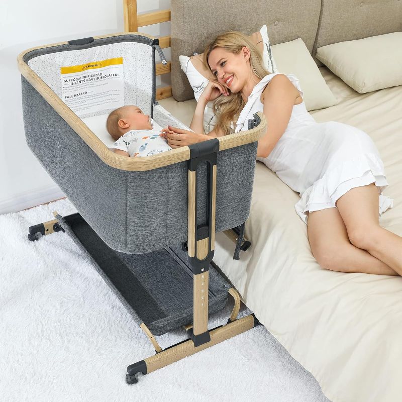 Photo 1 of AMKE 3 in 1 Baby Bassinets,Bedside Sleeper for Baby,Baby Cradle with Storage Basket, Easy to Assemble Bassinet for Newborn/Infant, Adjustable Bedside Crib,Safe Portable Baby Bed,Travel Bag Included Grey - Wood Grain