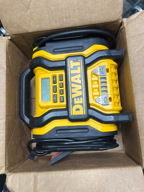 Photo 2 of DEWALT DXAEPS14 1600 Peak Battery Amp 12V Automotive Jump Starter/Power Station with 500 Watt AC Power Inverter, 120 PSI Digital Compressor, and USB Power , Yellow