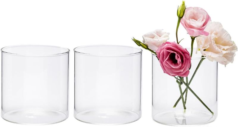 Photo 1 of 4 Inches Tall (10 cm) Clear Glass Cylinder vases,Pack of 3 Centerpiece Flower Vase,Floating Candle Holder for Home & Garden Decor, Wedding, Party
has candle in the glass