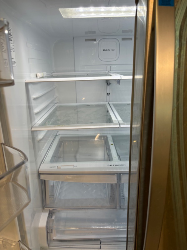 Photo 7 of 33 in. W 25 cu. ft. French Door Refrigerator in Stainless Steel
