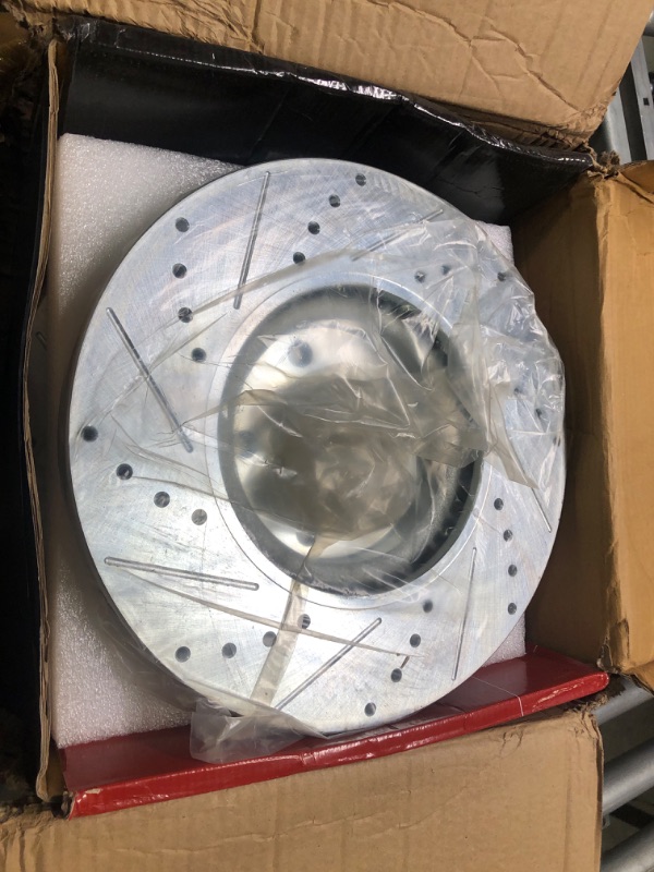 Photo 3 of 
A Premium Cross Drilled and Slotted Rotors 53005 BRS012218 (GKG)