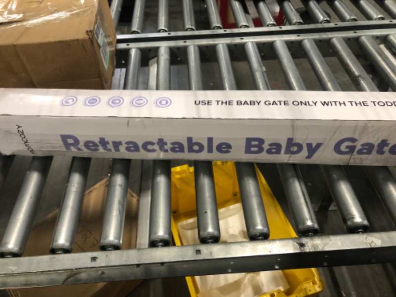 Photo 1 of Momcozy Retractable Baby Gate