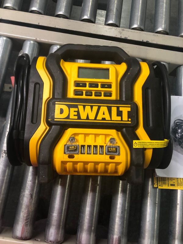 Photo 4 of DEWALT DXAEPS14 1600 Peak Battery Amp 12V Automotive Jump Starter/Power Station with 500 Watt AC Power Inverter, 120 PSI Digital Compressor, and USB Power , Yellow
