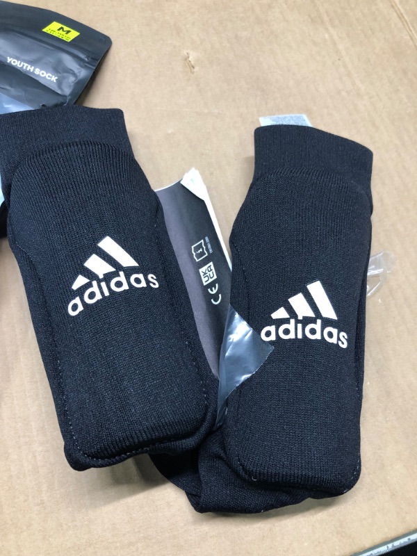 Photo 2 of adidas Unisex-Child Performance Youth Sock Shin Guards unisex-child Black/White Medium