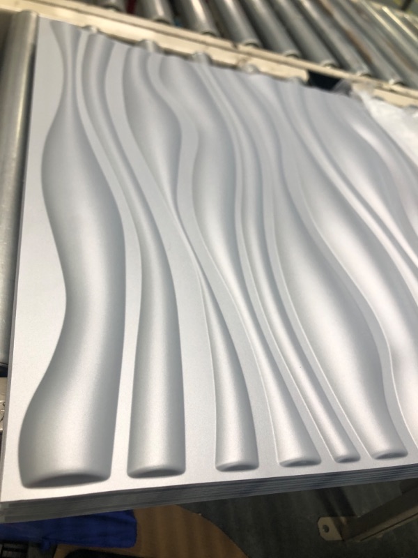Photo 2 of Art3d PVC Wave Board Textured 3D Wall Panels, Grey, 19.7" x 19.7" (12 Pack) Silver