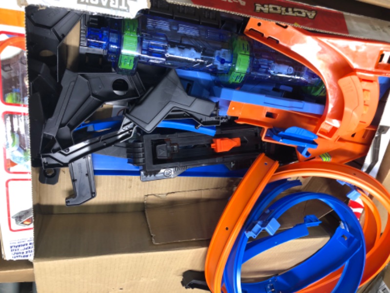 Photo 1 of Hot Wheels Track Set and Toy Car, Large-Scale Motorized Track with 3 Corkscrew Loops, 3 Crash Zones and Toy Storage??
