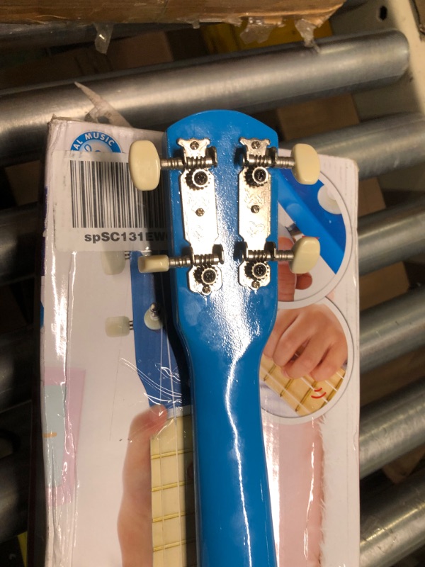 Photo 1 of Hape Kid's Wooden Toy Ukulele in Blue, L: 21.9, W: 8.1, H: 3 inch