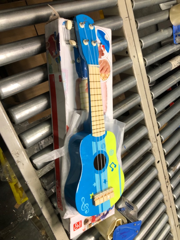 Photo 1 of Hape Kid's Wooden Toy Ukulele in Blue, L: 21.9, W: 8.1, H: 3 inch