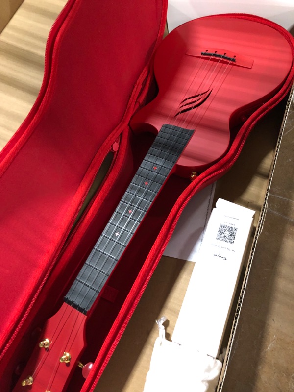 Photo 4 of ***MISSING TUNER*** Enya Concert Ukulele AcousticPlus Nova U/RD EQ 23” Cutaway Carbon Fiber Beginner Travel Ukulele Kit with Case, Strap, Capo, Strings (Red) 23 inch red