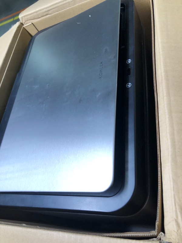 Photo 1 of ***HAS A LARGE DENT****Kohler 13 Gallon Motion Sensor Hands-Free Trash Can with Liner and Quiet Close Lid Stainless Steel 13 Gallon Motion Sensor Can