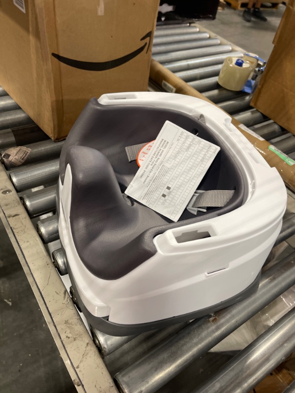 Photo 1 of Ingenuity Baby Base 2-in-1 Booster Feeding and Floor Seat with Self-Storing Tray, Slate