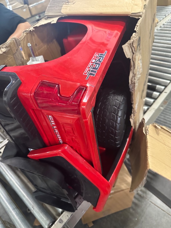 Photo 1 of 12V Chevy Silverado Ride On Truck with HIGH Speed Mode (5 MPH) & Parent Remote Control, Kid's Battery Powered Licensed Electric Vehicle, LED Lights, Real Tailgate, & Truck Sounds, by ReadyGO - Red