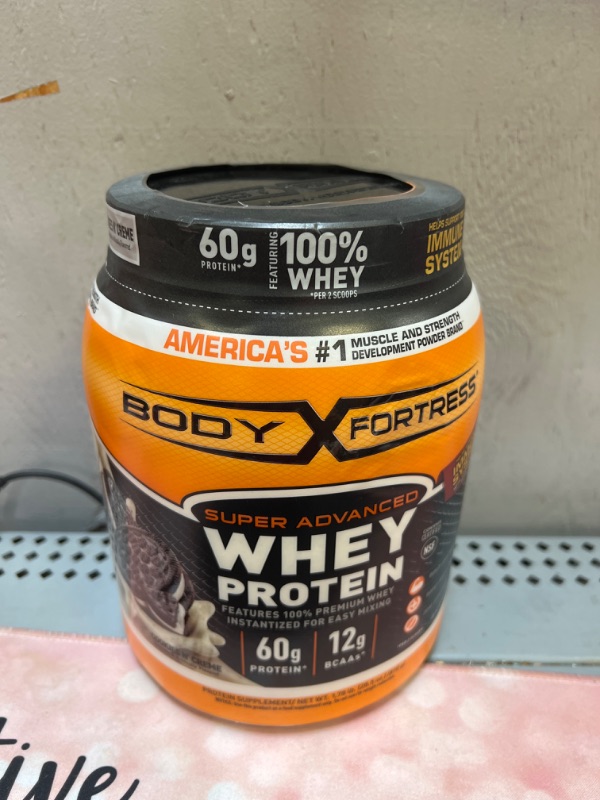 Photo 2 of Body Fortress Super Advanced Whey Protein Powder, Cookies N’ Crème, Immune Support (1), Vitamins C & D Plus Zinc, 1.78 lbs Cookies & Cream 1.78 Pound (Pack of 1)  EXP 03-08-2025
