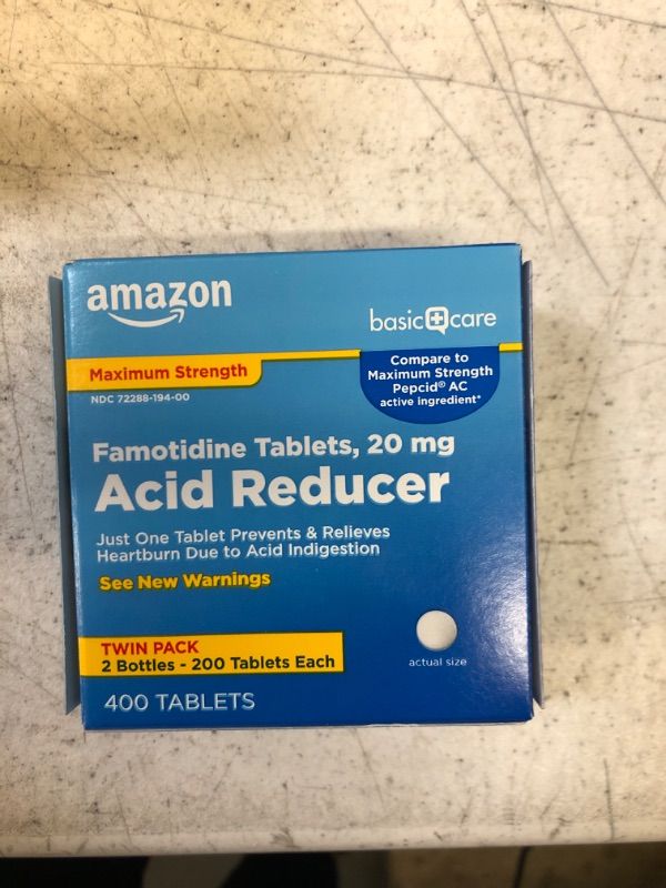 Photo 2 of Amazon Basic Care Maximum Strength Famotidine Tablets 20 mg, Acid Reducer for Heartburn Relief, 400 Count 400 Count (Pack of 1) EXP 10-2024