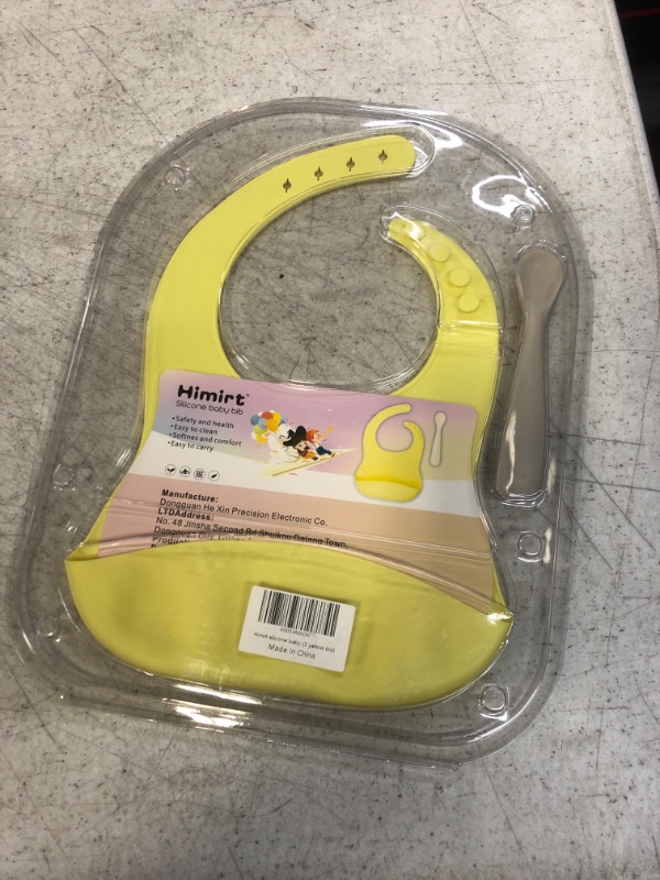 Photo 2 of Himirt baby bib and baby spoon set, soft adjustable waterproof bib for babies and toddlers, with pockets to catch food. (1 yellow bib, 1 spoon)