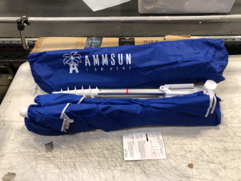 Photo 2 of AMMSUN 6.5ft Twice Folded Portable Beach Umbrella with Sand Anchor Windproof,Push Button Tilt and Air Vent UV 50+ Protection Fits in a Large Suitcase for Patio Garden Beach Pool Backyard Blue