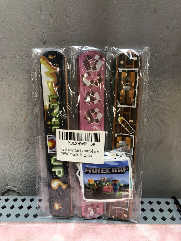 Photo 1 of Aojoeheao 82Pcs Birthday Party Favors,Slap Wristband Set,include 32Pcs Slap Wristband and 50Pcs Stickers,Best for the Goodie Bags for Game Themed Birthday Party