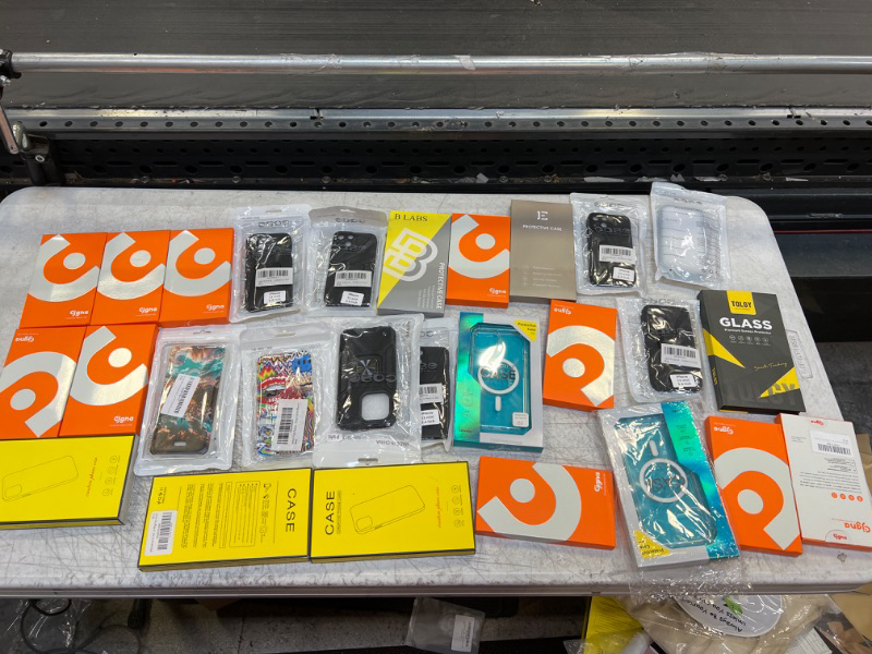 Photo 1 of BOX OF PHONE CASES 