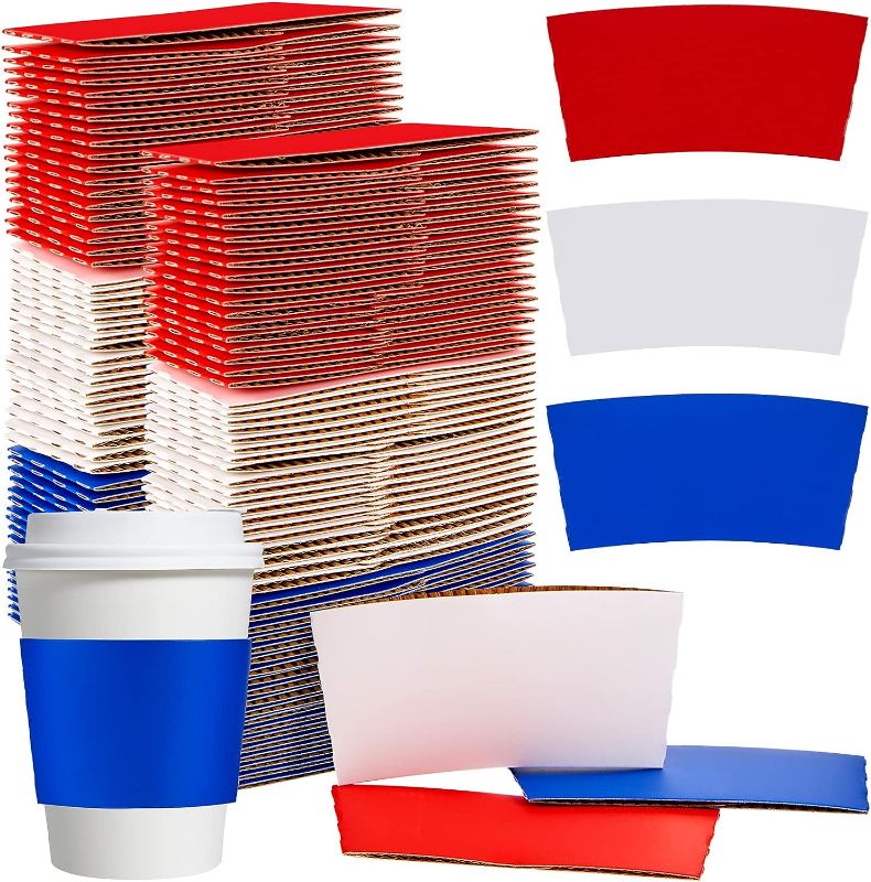 Photo 1 of 120 Pieces 4th of July Iced Coffee Cup Sleeves Coolers Sleeves 12-16oz Red White Blue Patriotic Cup Sleeves Bulk Independence Day Ice Insulated Disposable Cup Paper Jacket for Parties, Events
