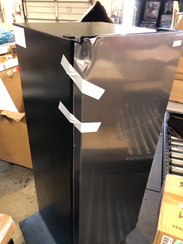 Photo 1 of 7 cu. ft. Convertible Upright Freezer/Refrigerator in Stainless Steel Garage Ready
MISSING SHELFS 
DAMAGED 
