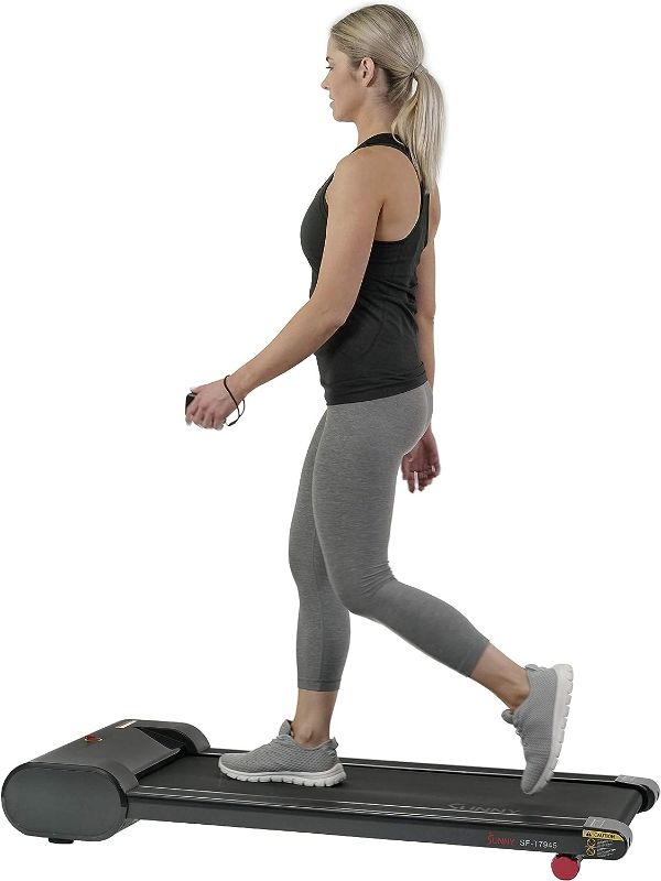 Photo 1 of Sunny Health & Fitness Slim Walking Pad Treadmill for Under Desk or Home Office w/Optional Arm Exercisers or Automated Desk

