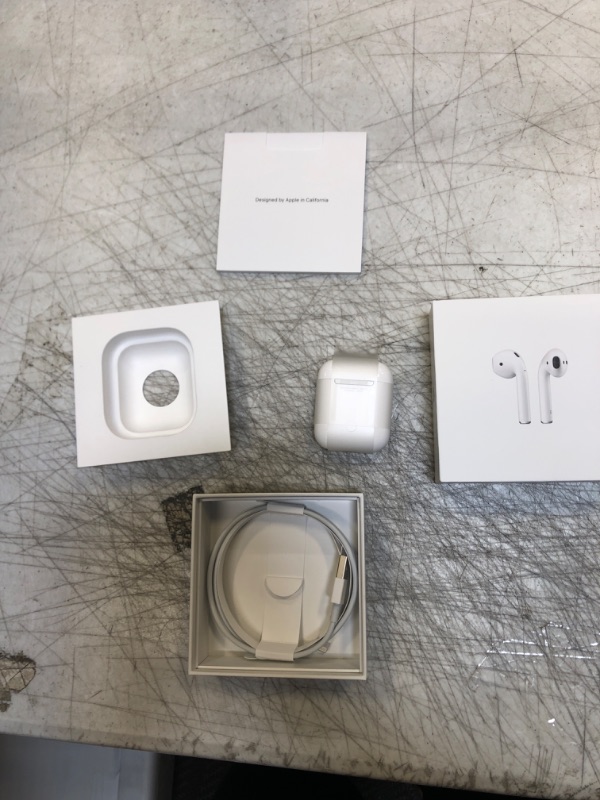 Photo 2 of Apple AirPods (2nd Generation) Wireless Earbuds with Lightning Charging Case Included. Over 24 Hours of Battery Life, Effortless Setup. Bluetooth Headphones for iPhone
