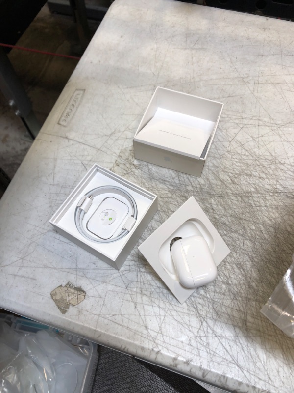 Photo 2 of Apple AirPods Pro (2nd Generation) Wireless Earbuds, Up to 2X More Active Noise Cancelling, Adaptive Transparency, Personalized Spatial Audio, MagSafe Charging Case, Bluetooth Headphones for iPhone ( used item ) 
