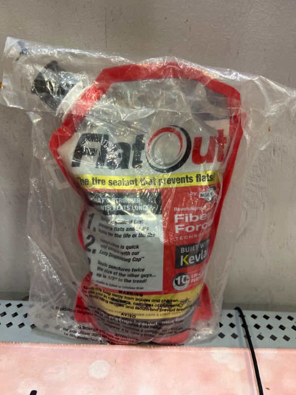Photo 1 of FlatOut Multi-Purpose Tire Sealant - Prevents and Repairs Flat Tires, Seals Leaks, Contains Kevlar, 32-Ounce Bag, 1-Pack 1-Pack (32 oz. Tire Sealant)