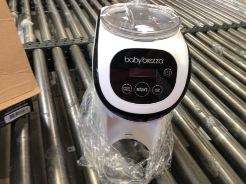 Photo 2 of Baby Brezza Formula Pro Mini Baby Formula Maker – Small Baby Formula Mixer Machine Fits Small Spaces and is Portable for Travel– Bottle Makers Makes The Perfect Bottle for Your Infant On The Go
