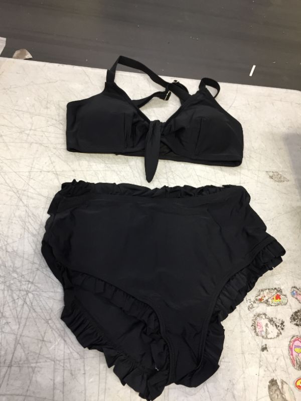 Photo 1 of WOMENS TWO PIECE SWIMSUIT SET
SIZE SMALL 