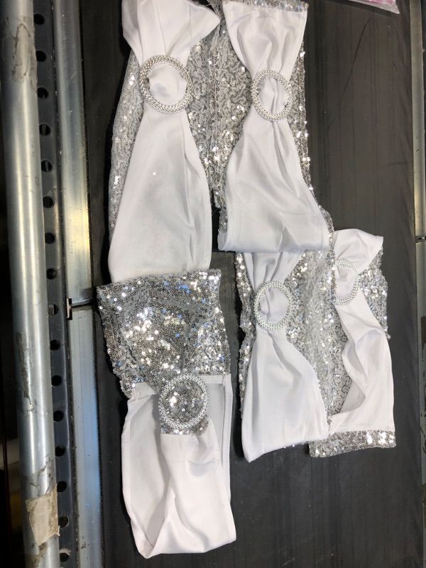 Photo 1 of 5pc silver and white chair sashes 