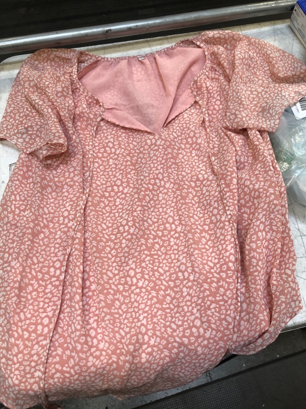 Photo 1 of A PINK FLOWY DRESS SIZE LARGE 