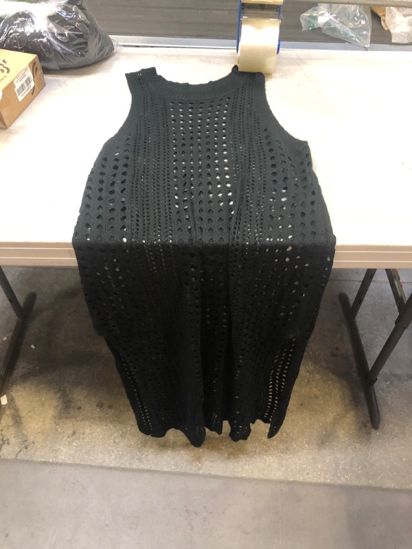 Photo 1 of black knitted dress with side slits one size 