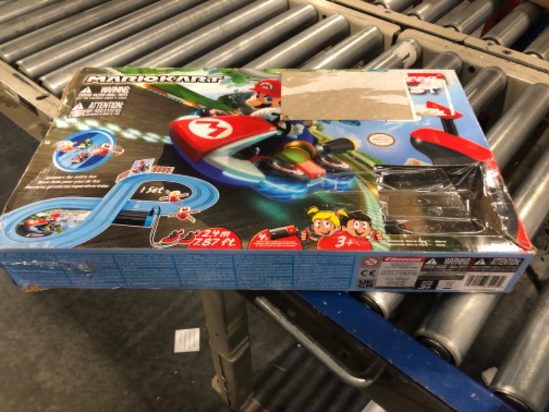 Photo 2 of Carrera First Mario Kart - Slot Car Race Track With Spinners - Includes 2 Cars: Mario and Yoshi - Battery-Powered Beginner Racing Set for Kids Ages 3 Years and Up Mario Kart w/ Spinners