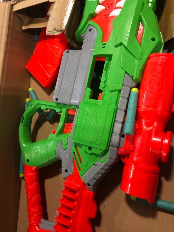 Photo 3 of NERF DinoSquad Rex-Rampage Motorized Dart Blaster, 10-Dart Clip, 20 Official Darts, 10-Dart Storage- T-Rex Dinosaur Design Frustration-Free Packaging