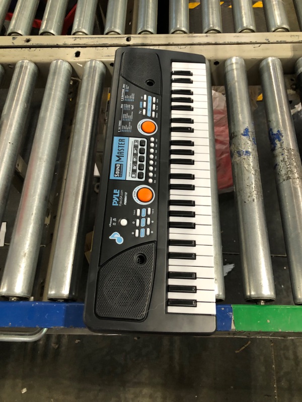 Photo 3 of ***MISSING MICROPHONE AND CORDS***

Digital Electronic Musical Keyboard - Kids Learning Keyboard 49 Keys Portable Electric Piano w/ Drum Pad, Recording, Rechargeable Battery, Microphone - Pyle PKBRD4112 Black 49 Keys Keyboard ***MISSING MICROPHONE AND COR