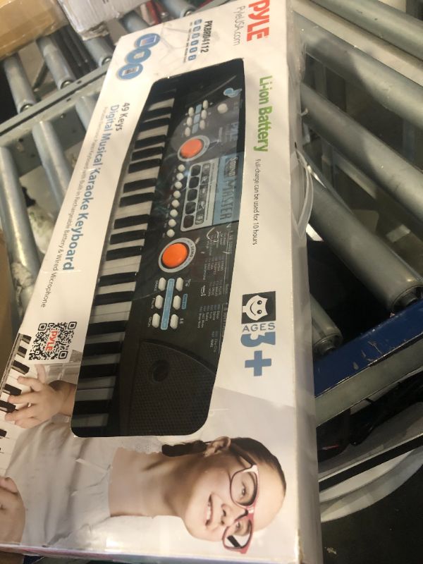 Photo 4 of Digital Electronic Musical Keyboard - Kids Learning Keyboard 49 Keys Portable Electric Piano w/ Drum Pad, Recording, Rechargeable Battery, Microphone - Pyle PKBRD4112 Black 49 Keys Keyboard ***MISSING MICROPHONE AND CORDS